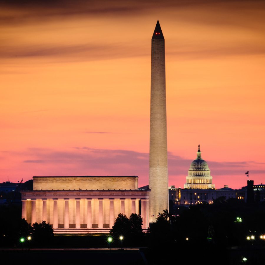 Glowing dawn sky over the skyline of Washington, DC.